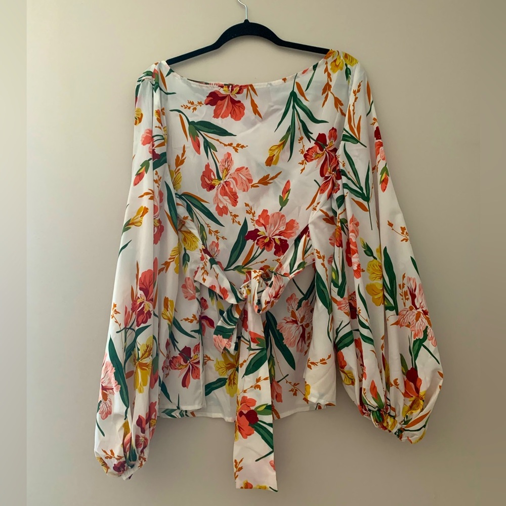 Floral long puffy sleeve blouse with waist tie.